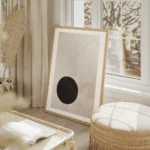 affiche avec un cercle noir et un carre trace sur un fond beige art graphique salon beige.webp