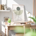 affiche avec un cercle vert fonce et une arche verte claire sur un fond blanc de bureau.webp