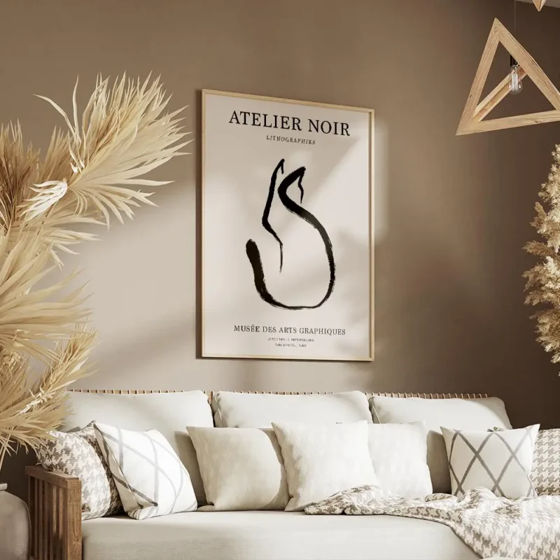 affiche avec un chat noir abstrait en line art sur fond beige avec du texte en t salon.webp