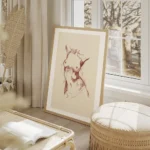 affiche avec un dessin de femme nue croquis aux traits rouges sur fond beige salon beige.webp