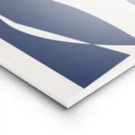 affiche avec un motif abstrait de visage geometrique bleu fonce sur fond beige c lightpanel.webp