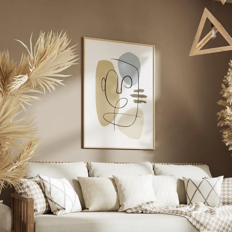 affiche avec un visage abstrait en art lineaire formes beiges et bleues sur fond salon.webp