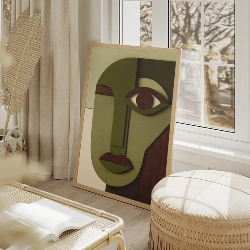 affiche avec un visage cubiste abstrait en tons de vert beige et marron fonce ut salon beige.webp