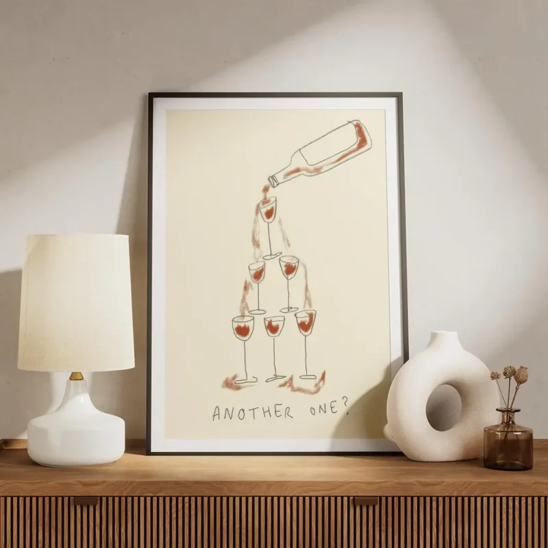 affiche avec une bouteille de vin rouge versant dans une pyramide de six verres meuble.webp
