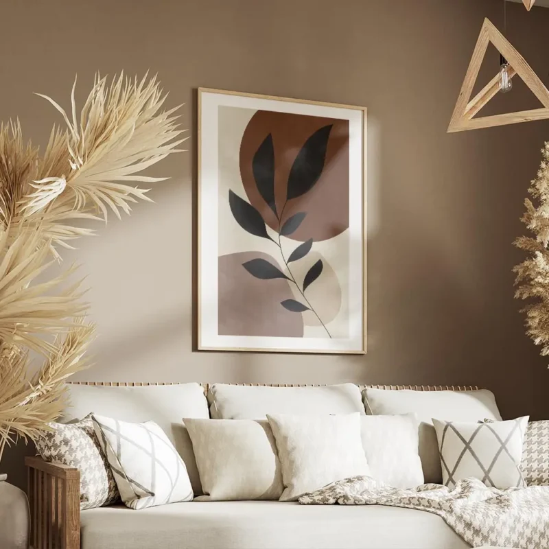 affiche avec une branche grise a feuilles devant des cercles lilas et marron sur salon.webp