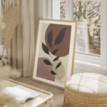 affiche avec une branche grise a feuilles devant des cercles lilas et marron sur salon beige.webp