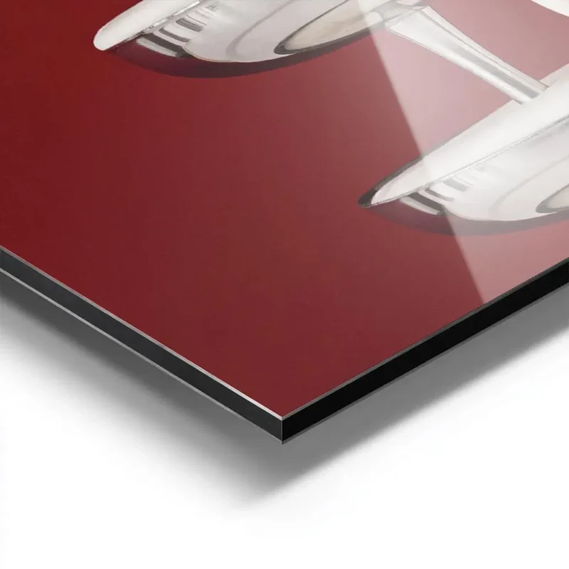 affiche avec une cascade de creme blanche versee sur des coupes a champagne arge aluminium.webp