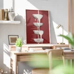 affiche avec une cascade de creme blanche versee sur des coupes a champagne arge bureau.webp