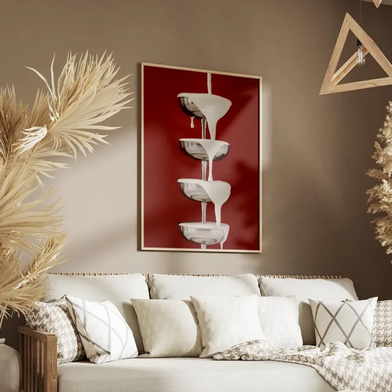 affiche avec une cascade de creme blanche versee sur des coupes a champagne arge salon.webp