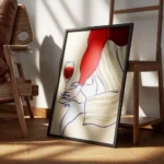 affiche avec une femme buvant du vin en robe rouge et lingerie bleue avec des ra encadre.webp