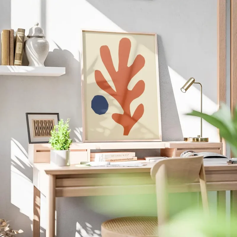 affiche avec une forme corallienne orange et un cercle bleu abstrait sur fond be bureau.webp