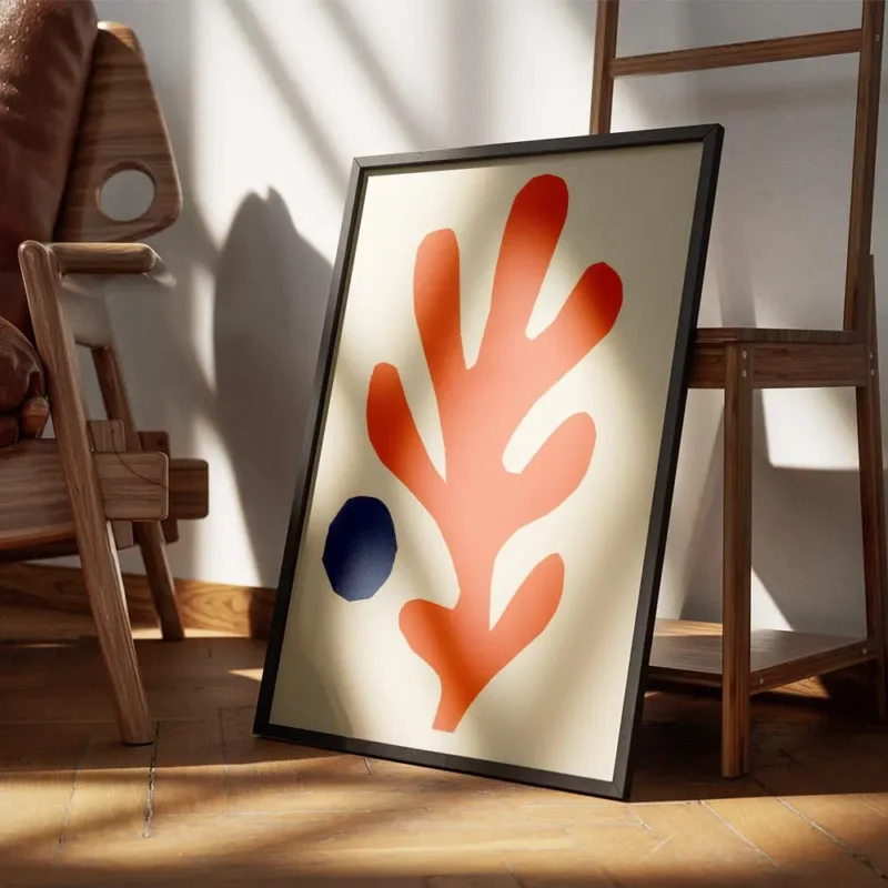 affiche avec une forme corallienne orange et un cercle bleu abstrait sur fond be encadre.webp