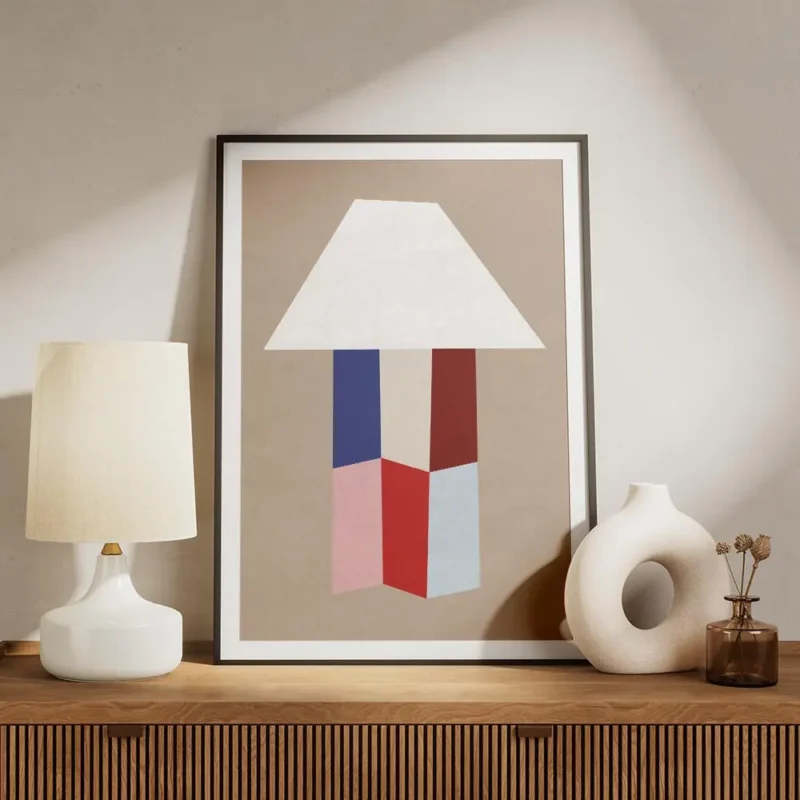 affiche avec une forme de lampe blanche abstraite son pied compose de formes geo meuble.webp
