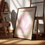 affiche avec une forme rose abstraite sur un fond blanc texte noir formes colore encadre.webp