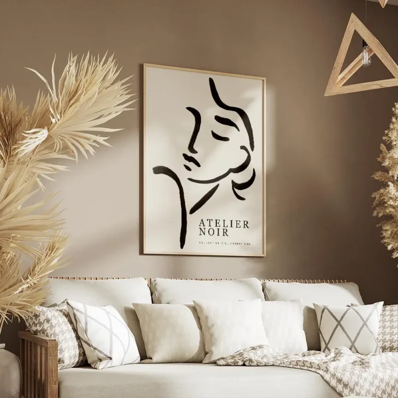 affiche avec une illustration de line art dun visage feminin abstrait en noir su salon.webp