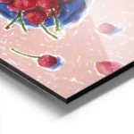 affiche avec une nature morte de cerises rouges et de petales sur une nappe rose aluminium.webp
