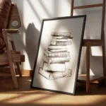 affiche avec une pile de livres sur la mode encadre.webp