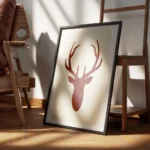affiche avec une silhouette de cerf rouge sur fond beige typographie aquarelle f encadre.webp