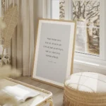 affiche avec une typographie noire sur fond gris clair affichant une citation de salon beige.webp