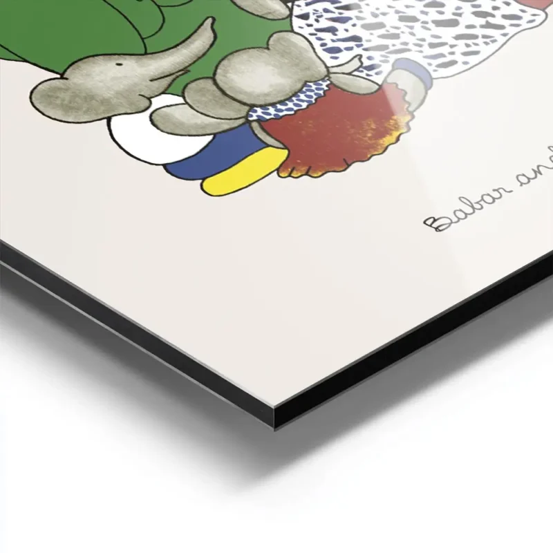affiche babar et sa famille reine celeste pom flora et alexandre lisant un livre aluminium.webp