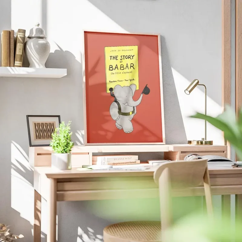 affiche babar lelephant portant une enseigne jaune avec le texte the story of ba bureau.webp