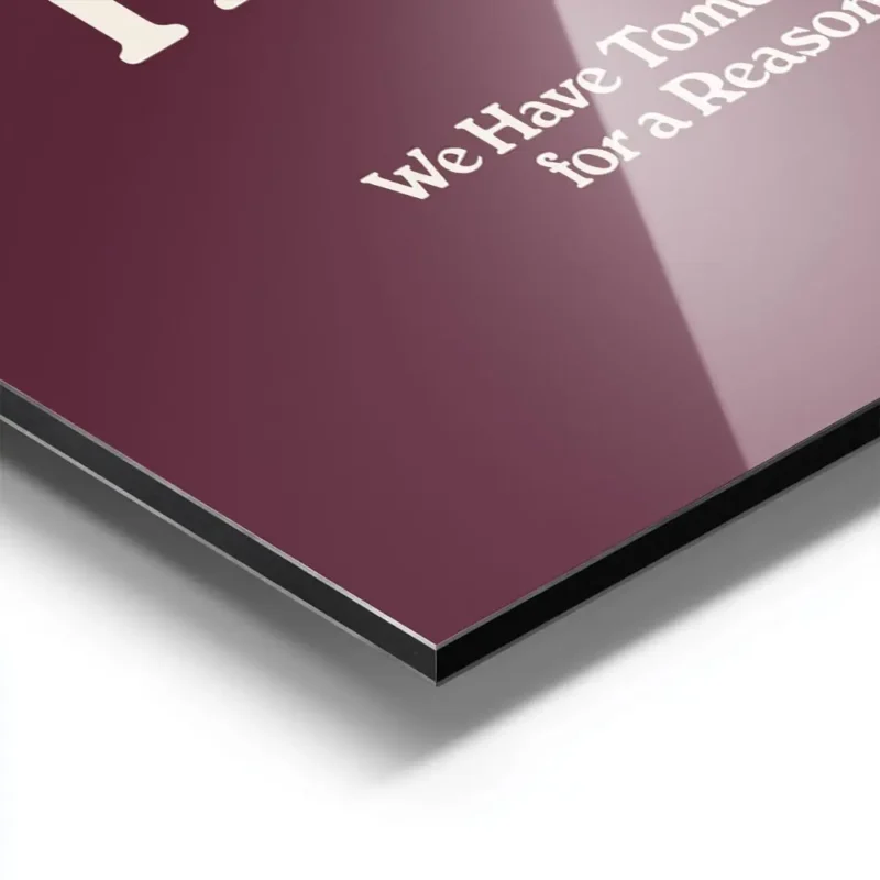 affiche bad day avec typographie blanche sur fond bordeaux presentant une citati aluminium.webp