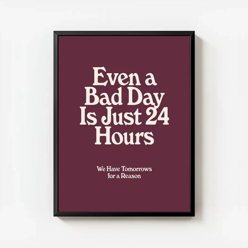 affiche bad day avec typographie blanche sur fond bordeaux presentant une citati avec cadre.webp