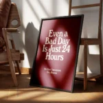 affiche bad day avec typographie blanche sur fond bordeaux presentant une citati encadre.webp