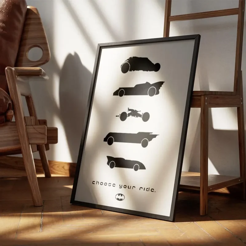 affiche batman avec silhouettes noires des batmobiles et le texte choose your ri encadre.webp