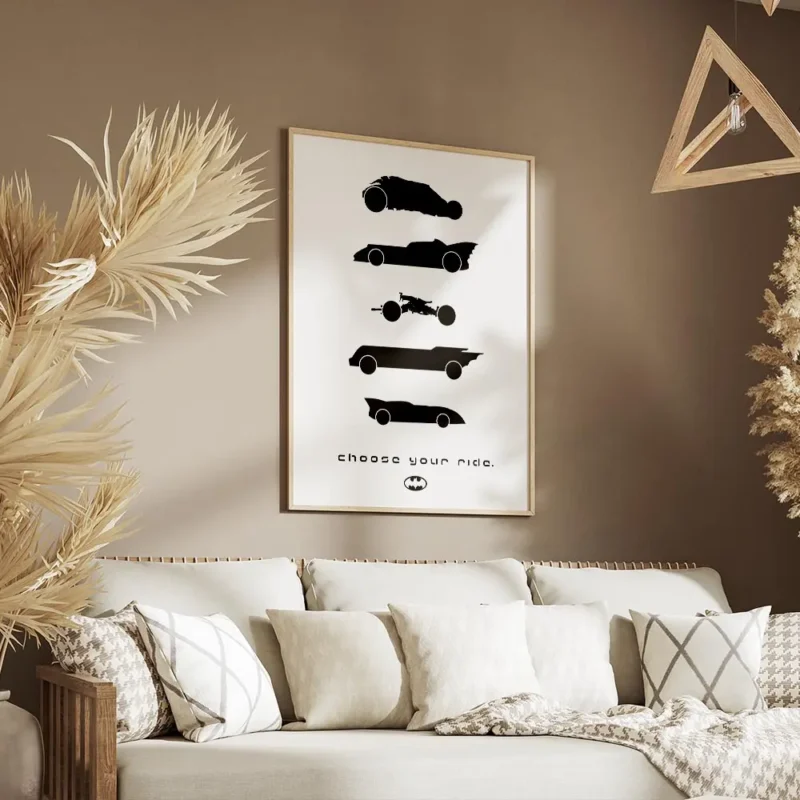 affiche batman avec silhouettes noires des batmobiles et le texte choose your ri salon.webp