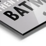 affiche batman typographie en noir et blanc sur fond gris avec le texte always b aluminium.webp