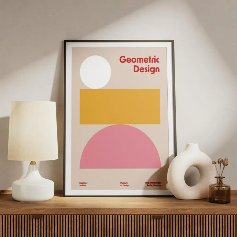affiche bauhaus avec cercle blanc rectangle orange demi cercle rose sur fond bei meuble.webp