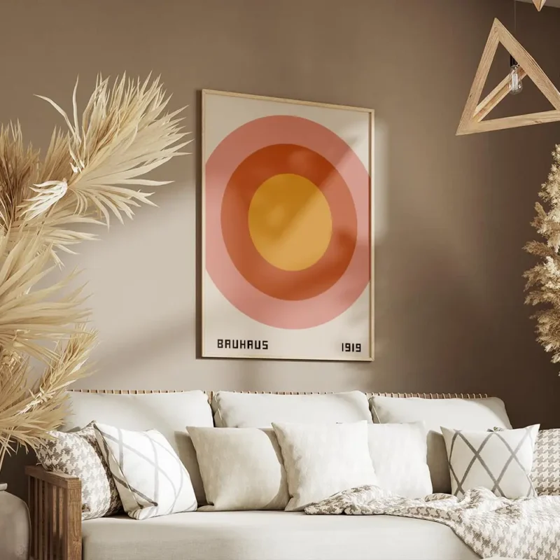 affiche bauhaus avec cercles concentriques rose orange et jaune retro typographi salon.webp