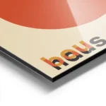 affiche bauhaus avec cercles orange et rouge se chevauchant texte bauhaus en typ aluminium.webp