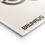 affiche bauhaus geometrique avec cercles noirs et typographie sur fond beige lightpanel.webp