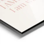 affiche beige clair avec typographie orange pastel disant je maime jaime mon cor aluminium.webp