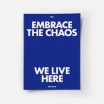 affiche bleue avec le texte embrace the chaos et we live here en blanc casse sty.webp