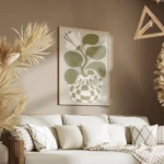 affiche bold flower une fleur blanche stylisee avec des feuilles vertes dans un salon.webp