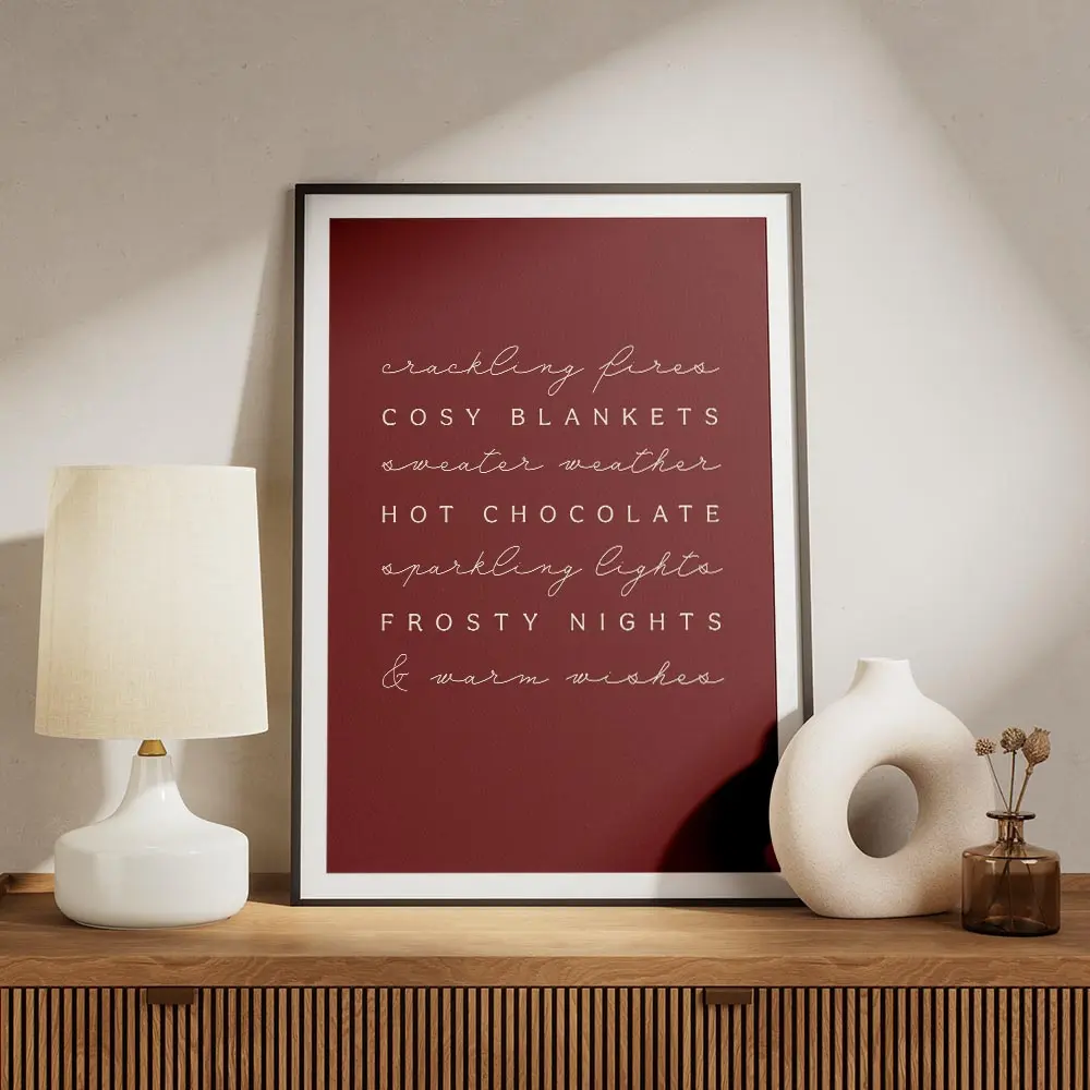 affiche bordeaux avec typographie blanche liste de mots sur lhiver cocooning et meuble.webp