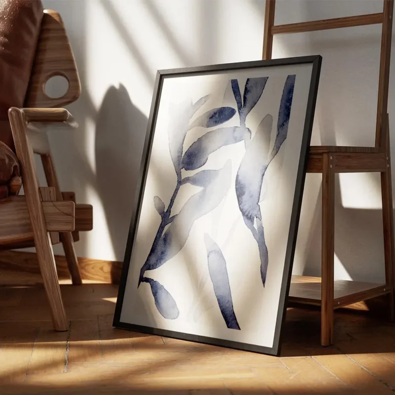 affiche botanique avec des feuilles de plantes bleues peintes a laquarelle sur f encadre.webp