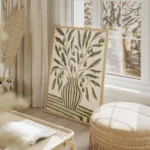 affiche botanique dun vase vert olive raye avec des branches dolivier et leurs f salon beige.webp