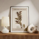 affiche botanique dune branche aux feuilles marron sur fond beige avec texte noi meuble.webp