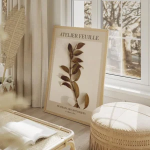 affiche botanique dune branche aux feuilles marron sur fond beige avec texte noi salon beige.webp