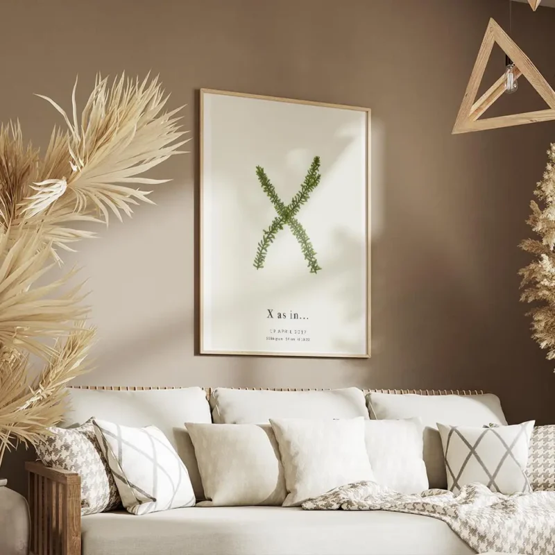 affiche botanique personnalisee avec la lettre x formee par des feuilles vertes salon.webp