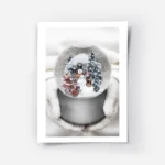 affiche boule a neige avec bonhomme de neige sapins et enfants tenue par des mai.webp