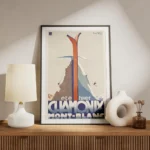 affiche chamonix vintage avec skis rouges croises devant une montagne enneigee a meuble.webp