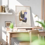 affiche collage de formes geometriques courbes aux couleurs terreuses et bleues bureau.webp