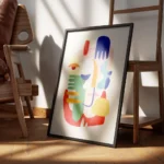 affiche coloree avec figure abstraite composee de mains dyeux et de traits de vi encadre.webp