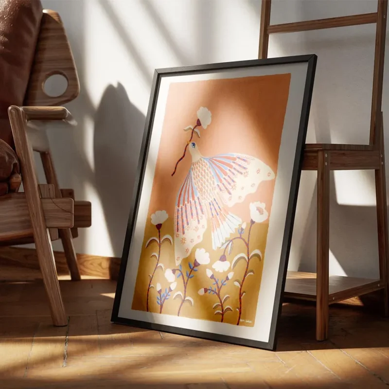 affiche coloree dun oiseau bleu et orange tenant une fleur entoure de fleurs bla encadre.webp