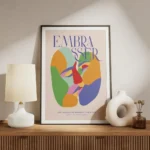 affiche coloree montrant deux visages abstraits sembrassant avec le mot embaasse meuble.webp